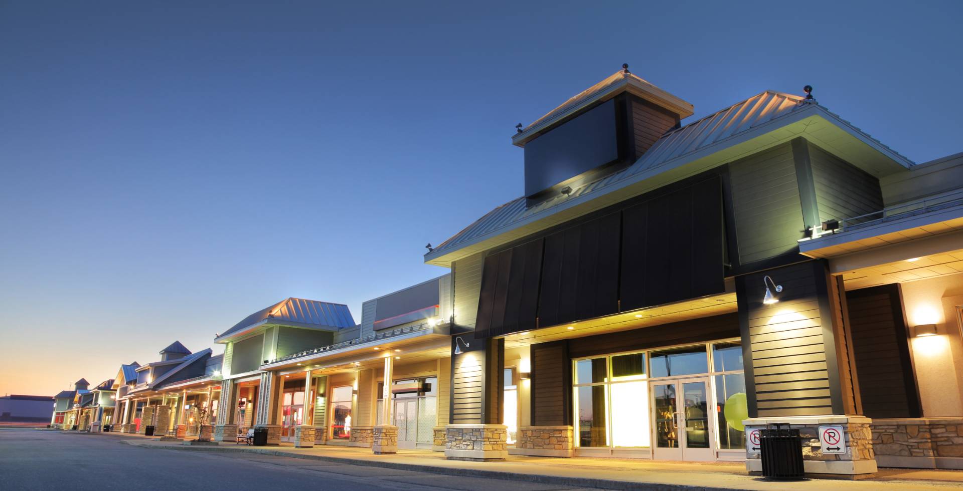 exterior view of commercial building with lights