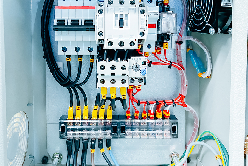 man installing electrical socket